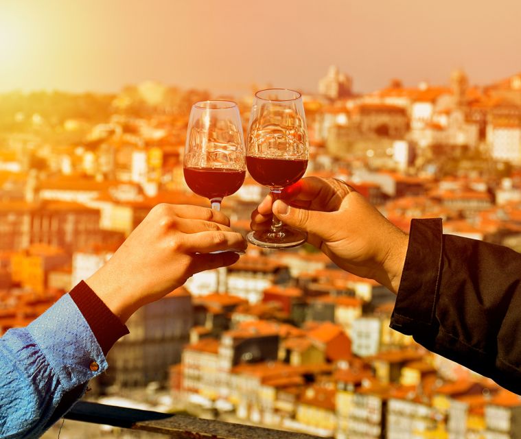 Porto: Tuk Tuk Sunset Tour with Glass of Port Wine - The electric tuk-tuk experience