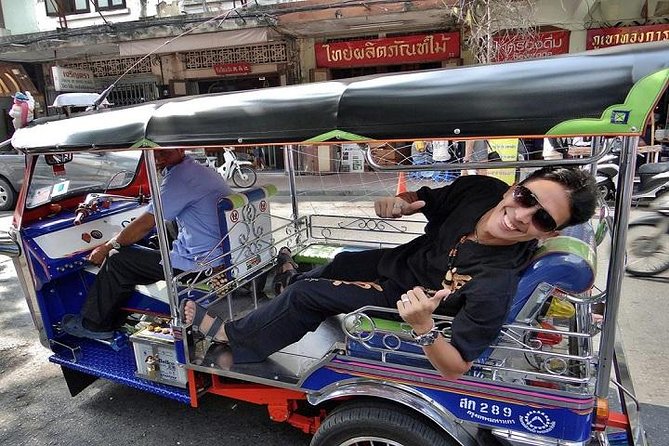 Private Bangkok Night Tour by Tuk Tuk with Dinner - Wat Arun lit across the river