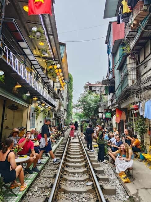 Private Half-Day Hanoi City Tour with Cyclo and Train street - Dong Xuan Market and the Business of the Old Quarter