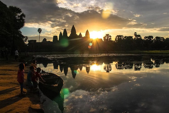 Private one-day tuktuk 'small tour' of the oldest Angkor temples - Ta Prohm: famous for roots, crowds, and atmosphere