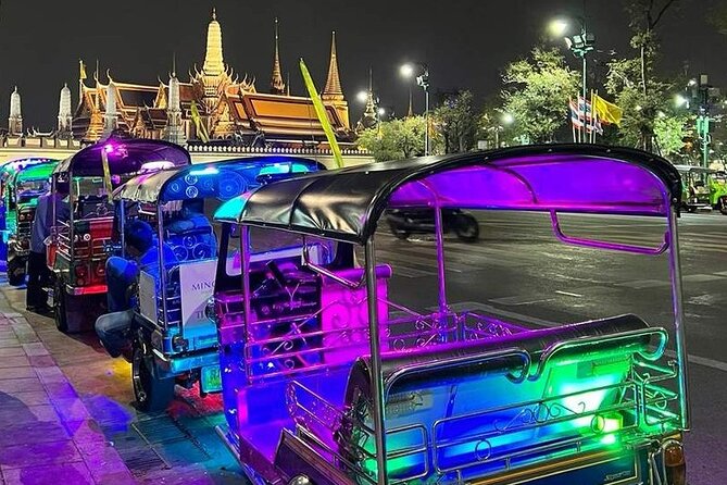 Private Tuk Tuk Night Adventure with Dinner - Wat Arun glowing beside the Chao Phraya