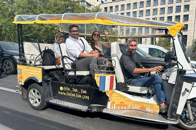 Privately Guided Panoramic Tour in Yellow Tuk Tuk from Madrid - Salamanca and Plaza de Colón