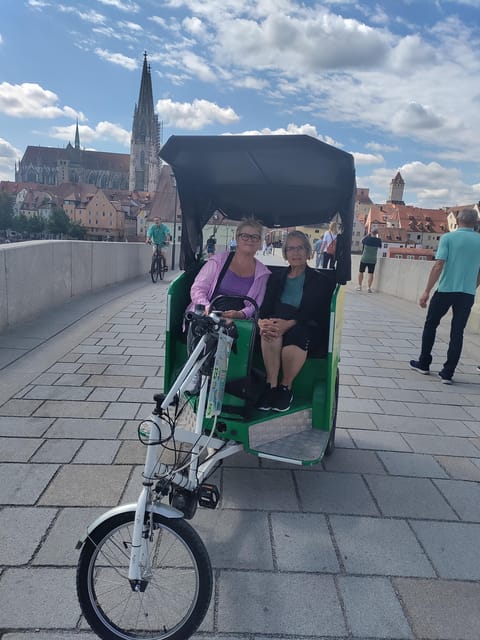 Regensburg citytour rickshaw-pedicab - The Stone Bridge and Baumberger Turm