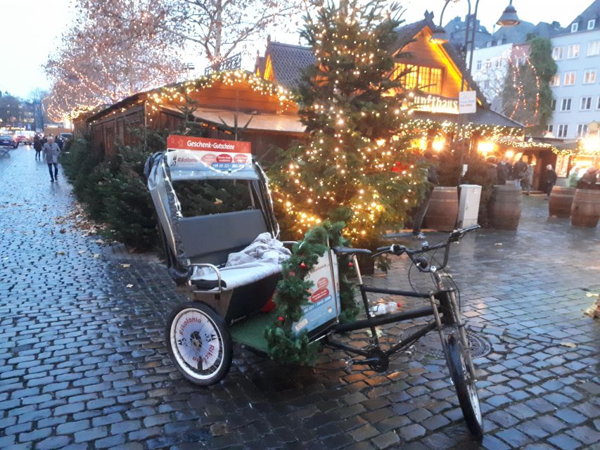Rickshaw Glühwein Ride - Following the Rhine Boulevard and riverfront