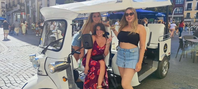 "See Madrid Differently: A Premium Private Tuk Tuk Ride" - Retiro Park, Neptune, and Plaza Colón