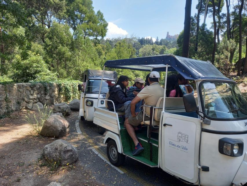 Sintra:1 hour tuk tuk experience to Pena Palace(3 monuments) - Biester Chalet and the forested road