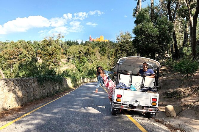 Sintra Electric Tuk Tuk Tour with Local Expert Guides 2h30 - Pena Palace and the lakes below it