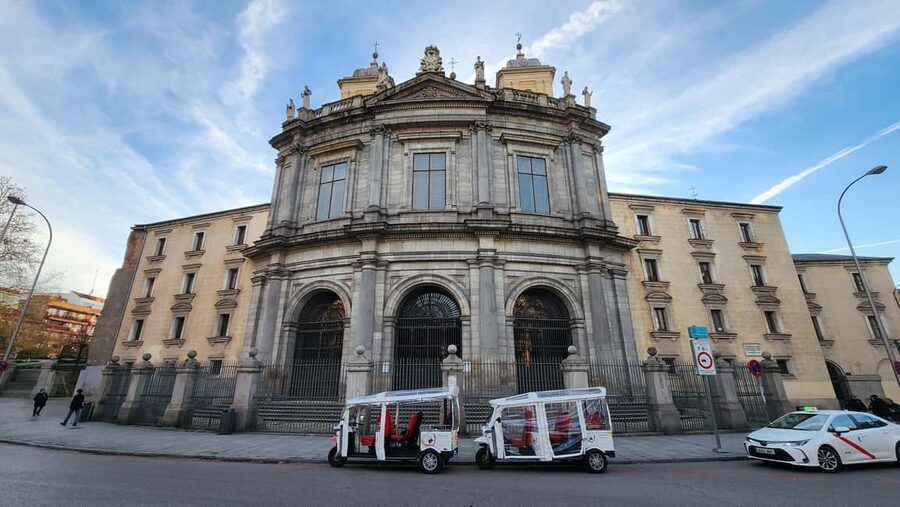 Tour Madrid: Secrets in a Electric Tuk Tuk - The Royal Palace and its Baroque front