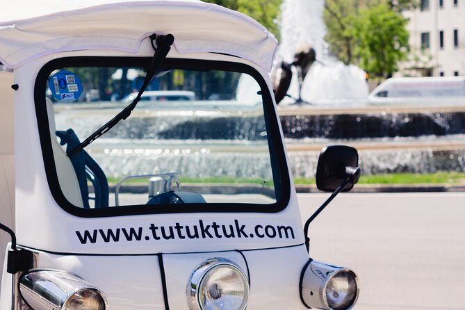 Tour of Historic and Modern Madrid with a guide in a yellow tuk tuk - Royal Madrid and the city’s main artery