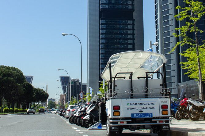 Tour of Historic and Modern Madrid with a guide in a yellow tuk tuk - Cervantes, Congress, and the city’s public face