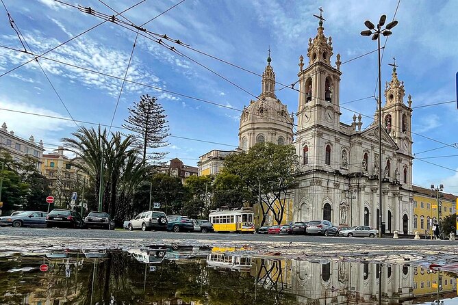 Tuk tuk experience through the historic neighborhood of Alfama - Senhora do Monte takes you higher