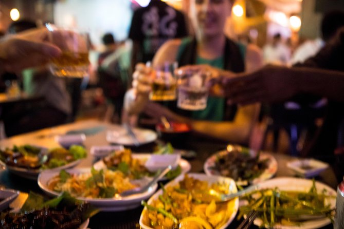 Ultimate Phnom Penh Food Tour by Tuk Tuk: 20 Tastings and Drinks - Russian Market after dark