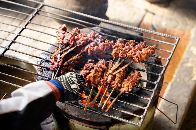 Ultimate Siem Reap Food Tour by Tuk Tuk - 20 Tastings, 8 Stops - Fruit, insects, and local snacks toward Angkor Wat