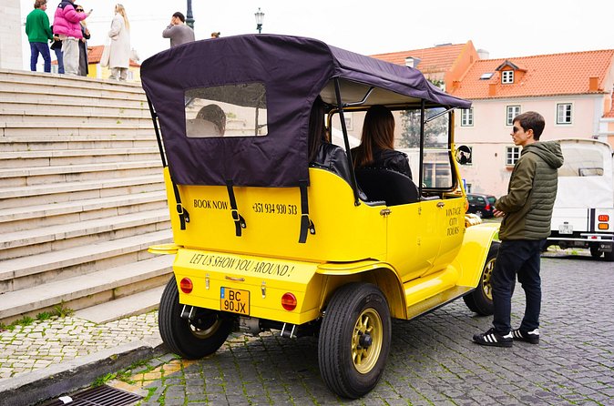 Vintage Tuk Tuk Tour experience in Alfama, Chiado, and Baixa 2h - Portas do Sol brings Alfama into view